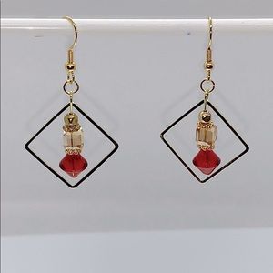 21062 Amber glass and red rhinestone earrings